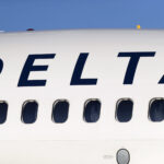 Delta plane wing clips empty aircraft during pushback from gate in Atlanta