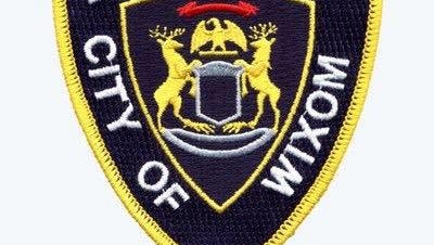 Unresponsive man pulled from Wixom swimming pool
