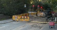Road still closed ten days after being hit by sudden flooding