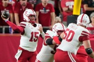 Nebraska holds off Cincinnati with late interception for 20
