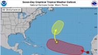Invest 97L development chances increase. Here's the tropical outlook