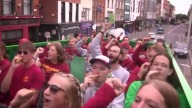 Iowa State band rides around Dublin in double-decker bus playing fight song on kazoo