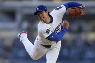Shohei Ohtani gets first victory with Dodgers, striking out season