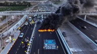Israeli protesters block highway with burning tyres