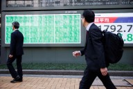 Asia stocks mostly higher as tariff truce supports sentiment