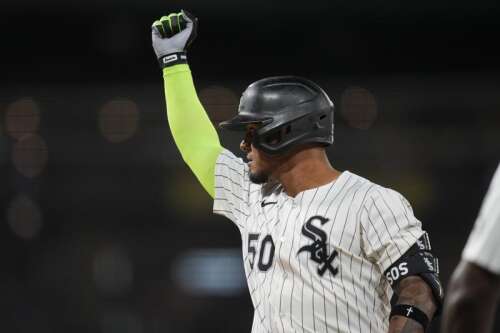 Massey, Isbel get run-scoring hits in 9th as Royals rally to beat White Sox 5