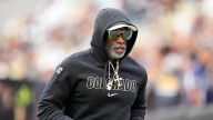 Deion Sanders back to coaching after cancer diagnosis and treatment