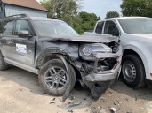 Vehicle crashes into Verona home, two parked cars; driver flees scene