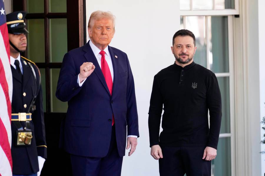 The Latest: Zelenskyy signals openness to three-way meeting with Trump and Putin