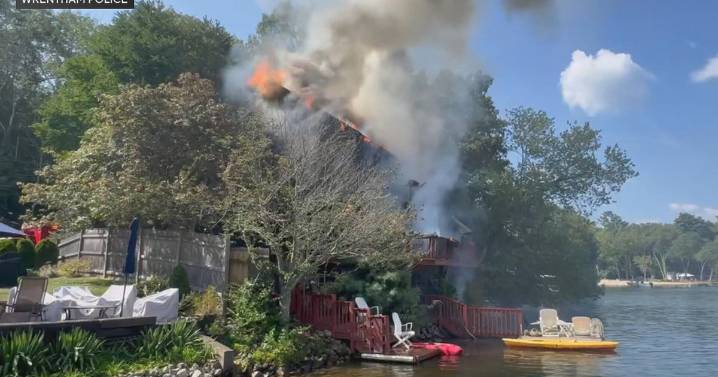 Woman jumps into arms of police officers to escape burning home on Lake Pearl in Wrentham