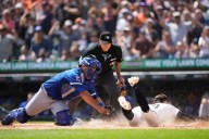 Pasquantino and Garcia homer as the Royals hold off the Tigers for a wild 10