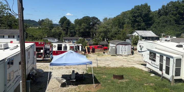 Milton city worker dead after being trapped in ditch