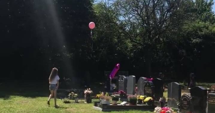 Mum's captures chilling moment 'baby's spirit returns to put a balloon on her grave'