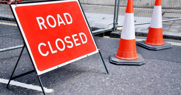 Police close main road in Swindon after water pipe bursts