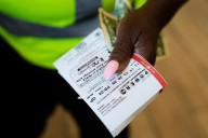 Sunblock, charcoal … and Powerball? Holiday weekend lottery drawing worth $1 billion