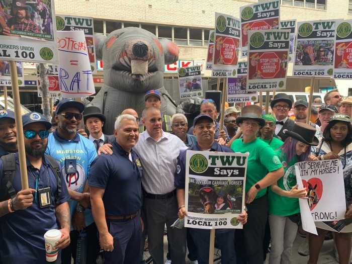 Fed up union members rally ouside Bottcher’s office to rein in support for horse