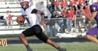 Burton pounds Holland in opener