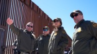 Kristi Noem says border wall to be painted black to deter people from climbing it