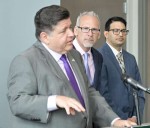 While promoting vaccines, Pritzker takes shots at Trump administration