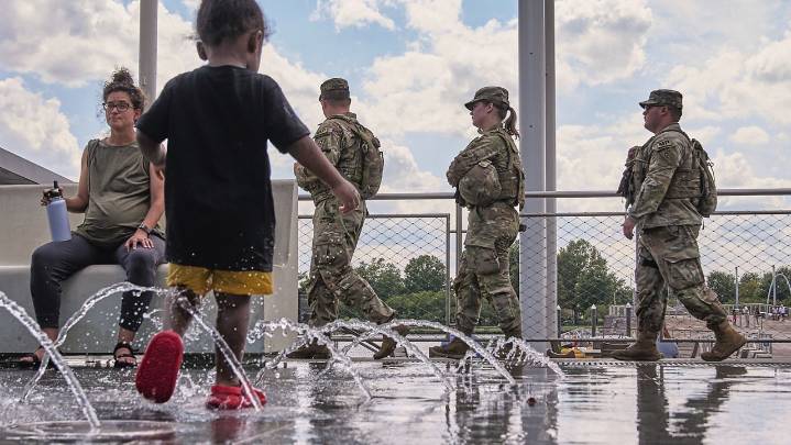 'Leave our kids alone': Schools reopen in DC with parents on edge over Trump's armed patrols