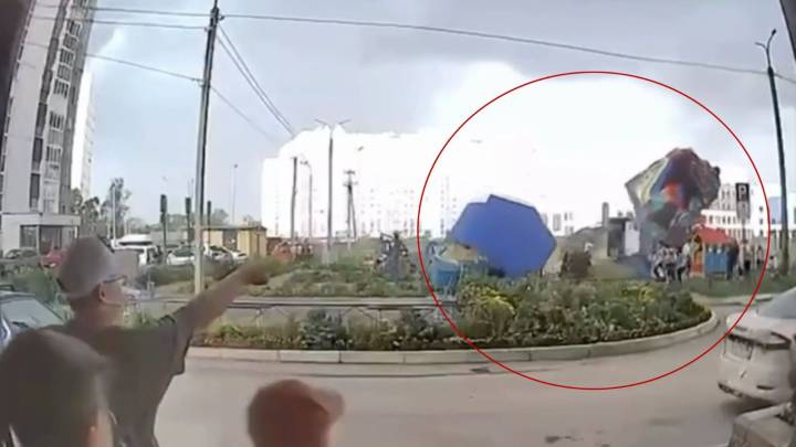 Watch terrifying moment bouncy castle is thrown into the air during horror gales leaving at least four children injured