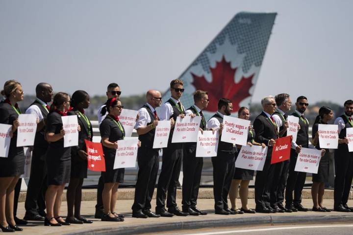 Air Canada flight attendants could serve strike notice after midnight tonight