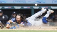 Pasquantino and Garcia homer as the Royals hold off the Tigers for a wild 10