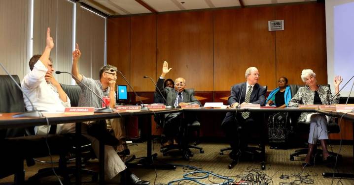 City planning commissioner also VP, attorney for developer