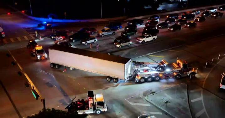 Tractor-trailer causes crash involving 18 vehicles on I