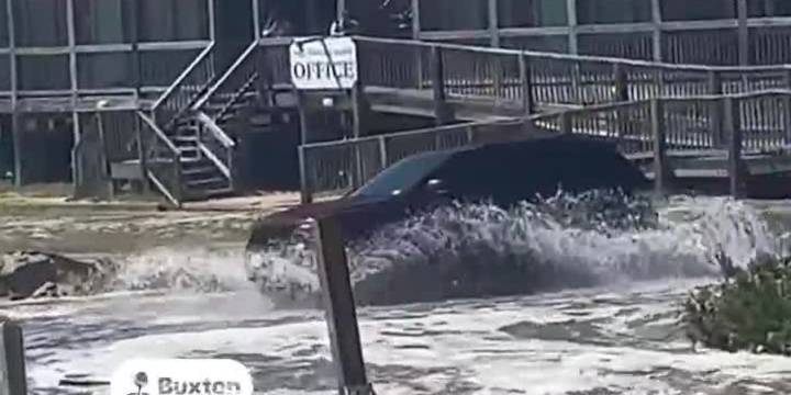 Photographer captures Highway 12 ocean overwash from Hurricane Erin