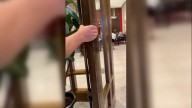 Father shares video of children running out of the building after shots were fired