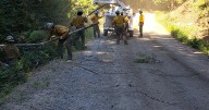 Wildfire forces evacuations, destroys 3 structures