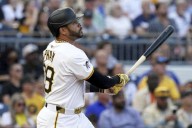 Marte hits 3 doubles, Martinez pitches Reds past Pirates