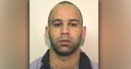 Prisoner held hand of Gooch gang boss Lee Amos as he clutched chest in agony behind bars, inquest into his death hears