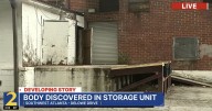 Woman found dead inside storage behind SW Atlanta shopping complex
