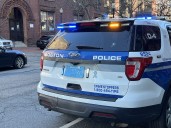 1 woman dead in Hyde Park shooting, 1 in custody faces murder charge