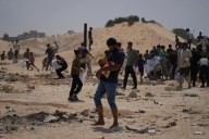 Netanyahu defends new military offensive in Gaza and says it will be wider than announced