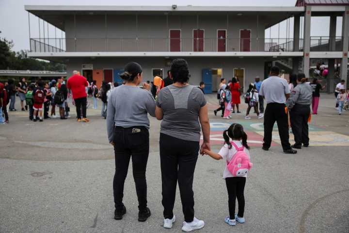 Immigrant families fear Trump's deportations as children return to school