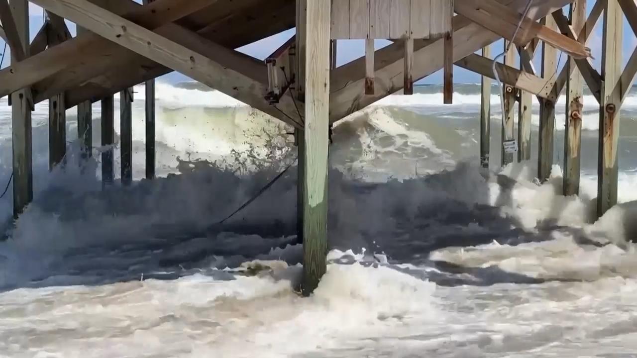 Waves swell in North Carolina's Outer Banks as Hurricane Erin approaches