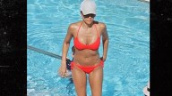 Jessica Alba Shows Off Tan in Cheeky Red Swimsuit in Miami