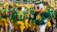 Oregon's mascot takes tumble, head pops off