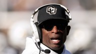 Deion Sanders Returns to Coaching With Portable Toilet After Cancer Surgery