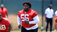 NFL heaviest player at 464lbs deemed too fat to play and forced to watch on from sidelines until he loses weight