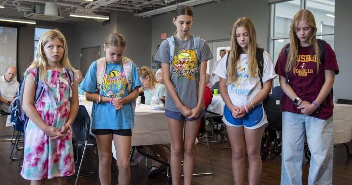 Church event sends students, teachers off for school year with a blessing