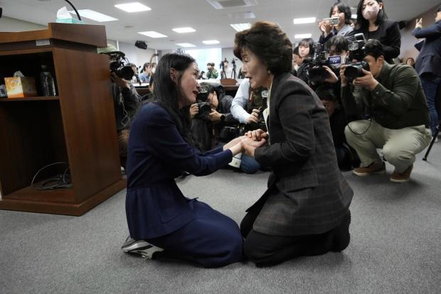 Woman seeks compensation from South Korea over her forced adoption to France in 1984