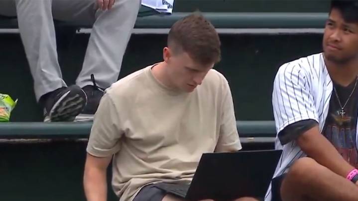 Cubs Fan Goes Viral for Working on His Laptop In Bleachers During Game
