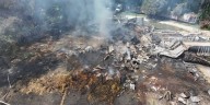 Firefighters put out hot spots after feed store burned down in Reddick