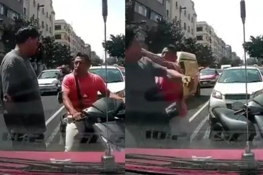 VIDEO: Motociclista noquea a taxista tras chocar en CDMX; el agresor huyó
