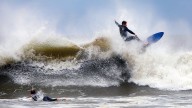 Surfers take advantage of Hurricane Erin waves in Westport