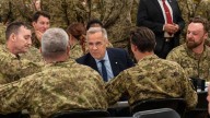 'We need a stronger Canada,' Carney tells troops in Latvia